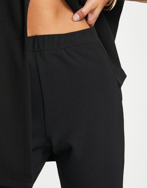 ASOS DESIGN Petite jersey slim kick flare suit pants in black, 3 of 4