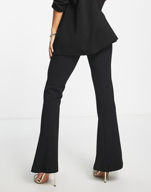 ASOS DESIGN Petite jersey slim kick flare suit pants in black ASOS