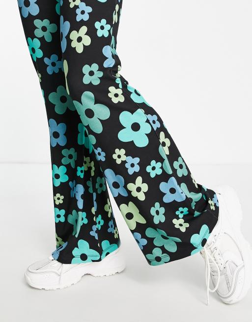 ASOS DESIGN kick flare pants in blue floral print