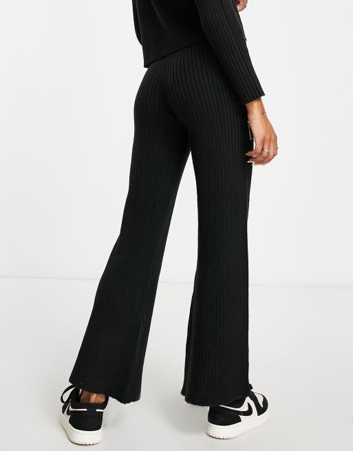 Plain knit flared trousers - Women's fashion