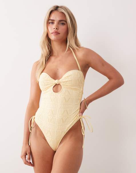 ASOS DESIGN Petite Kyle broderie twist front knot swimsuit with tie side detail in buttermilk - view 1