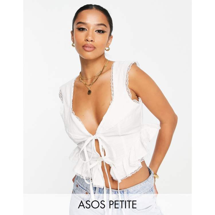 ASOS DESIGN Petite long sleeve crop top with mesh corset detail in white