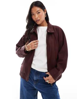 ASOS DESIGN Petite leather look bomber jacket in burgundy-Red