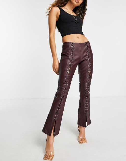 ASOS DESIGN Petite faux leather high waist flare pants in black