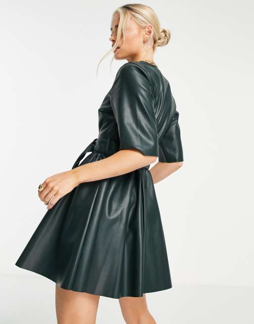 ASOS DESIGN Petite leather look t-shirt mini skater dress with belt in  bottle green | ASOS