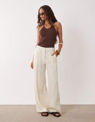 ASOS DESIGN Petite linen blend wide leg pants with pleated detailing in cream-White