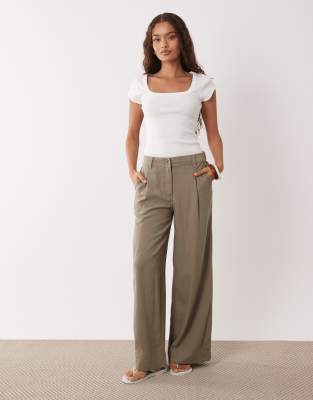 ASOS DESIGN Petite linen blend wide leg pants with pleated detailing in khaki-Neutral