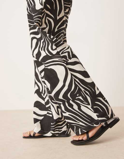 ASOS DESIGN Petite linen look pull on pants in spliced zebra print
