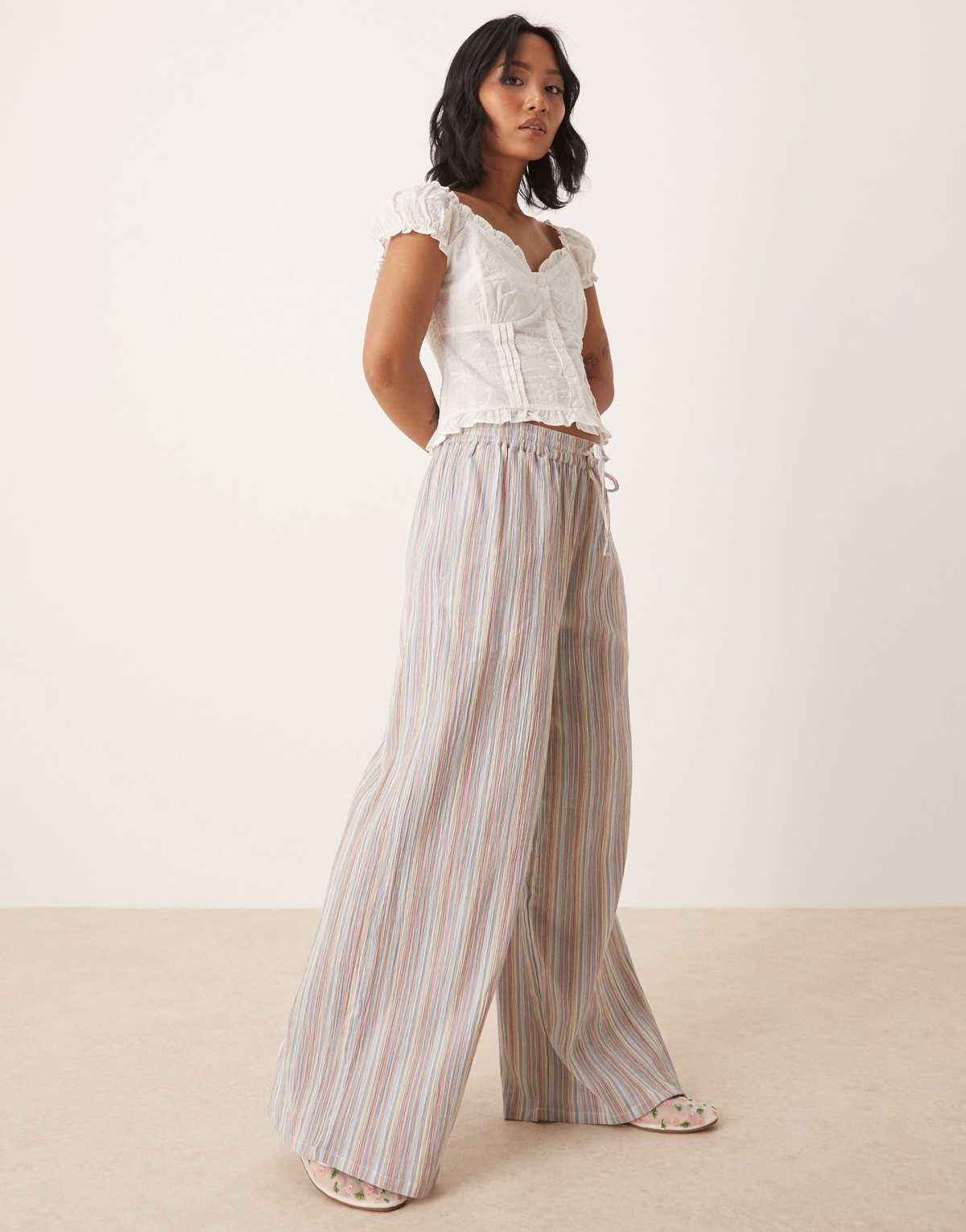 ASOS DESIGN  Petite linen look pull on straight leg trousers in multi stripe