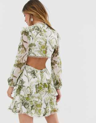 Asos design long sleeve mini dress in floral print with shop cluster embellishment detail and circle trims