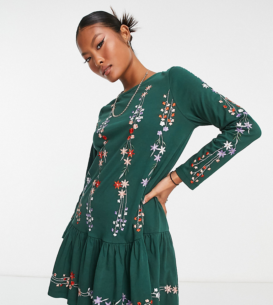 ASOS DESIGN Petite long sleeve smock dress with pep hem with floral embroidery in bottle green