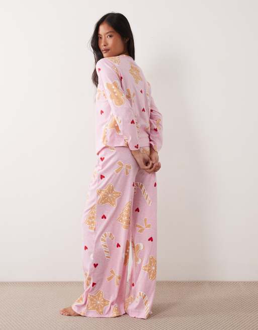 ASOS DESIGN Petite long sleeve top & wide leg trouser pyjama set with sweets graphic, 3 of 4