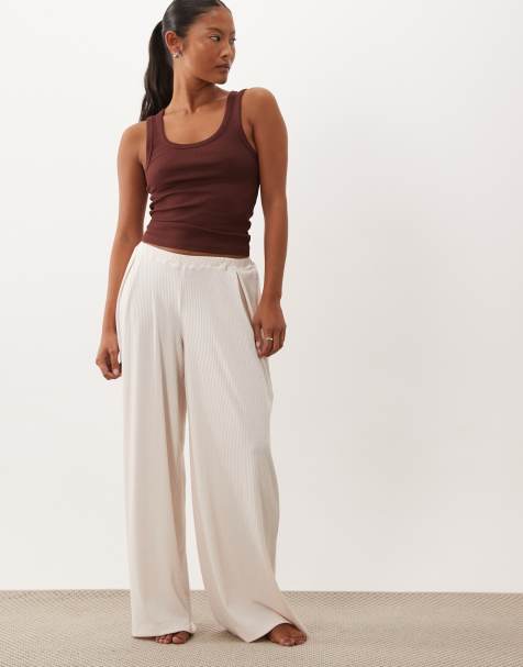 ASOS DESIGN Petite lounge mix & match ribbed wide leg pajama bottoms in cream - view 1