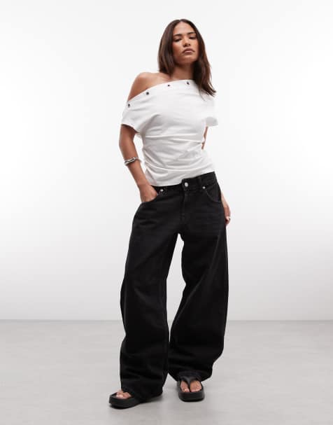 ASOS DESIGN Petite low rise baggy jeans in black