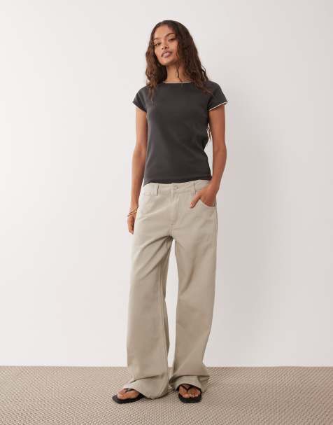 ASOS DESIGN Petite low rise baggy jeans in neutral - view 1