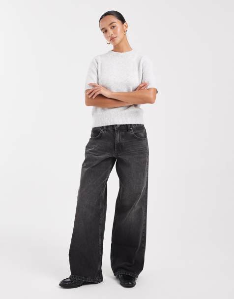 ASOS DESIGN Petite low rise baggy jeans in washed black 