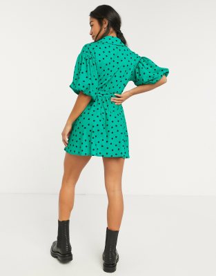 green polka dot puff sleeve dress