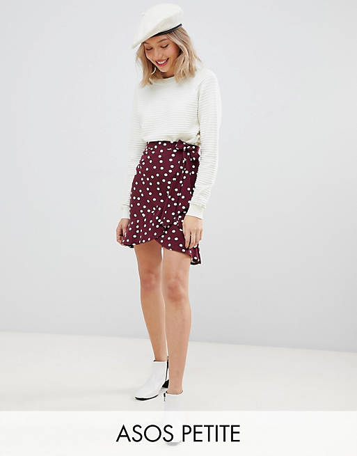 ASOS DESIGN Petite mini wrap skirt in polka dot print