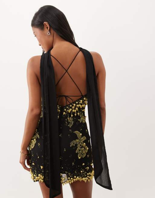 ASOS DESIGN Petite minikjole med blomster og pyntet v-hals med tørklæde i sort og gul, 2 af 4