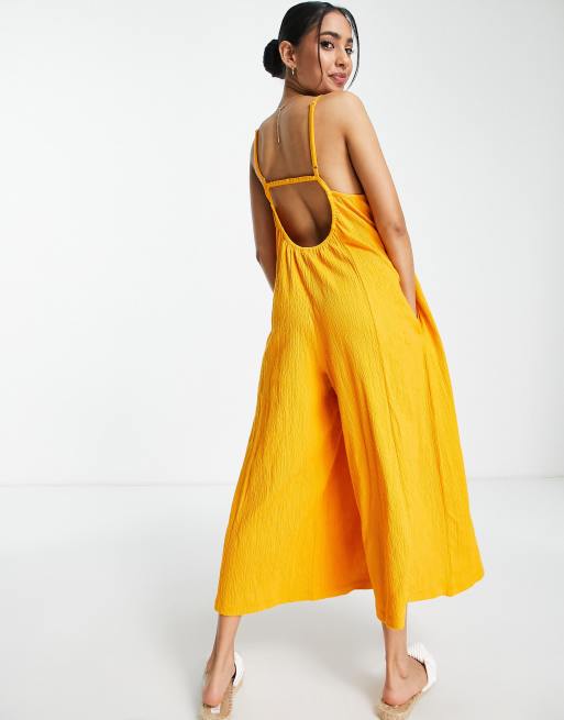ASOS DESIGN Petite - Minimalistisk cami-jumpsuit med vidde i orange krølstof, 3 af 4