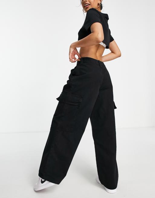 ASOS DESIGN Petite oversized sweatpants in acid wash black