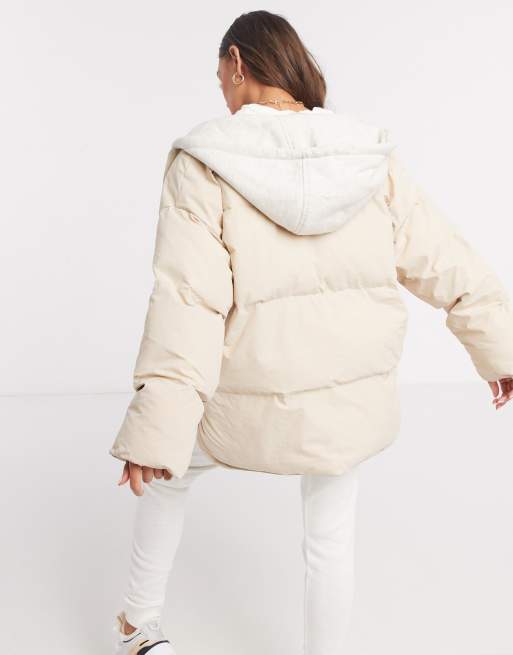 ASOS DESIGN Petite oversized jersey hooded puffer jacket in cream