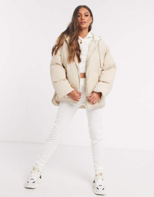 ASOS DESIGN Petite oversized jersey hooded puffer jacket in cream