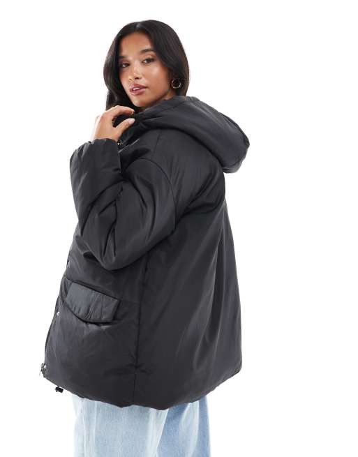 ASOS DESIGN Petite oversized puffer jacket with hood in black