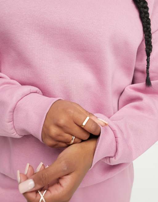 ASOS DESIGN Petite oversized sweatshirt in pink