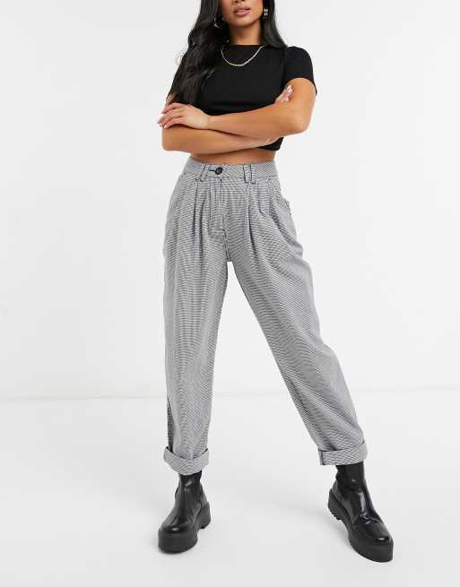 ASOS DESIGN Petite ovoid pleat front peg pant in black and