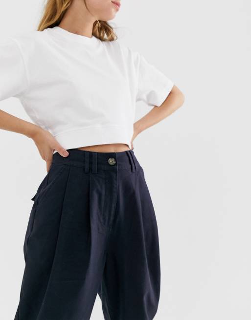 ASOS DESIGN Petite ovoid pleat front peg pants in khaki, 3 of 4