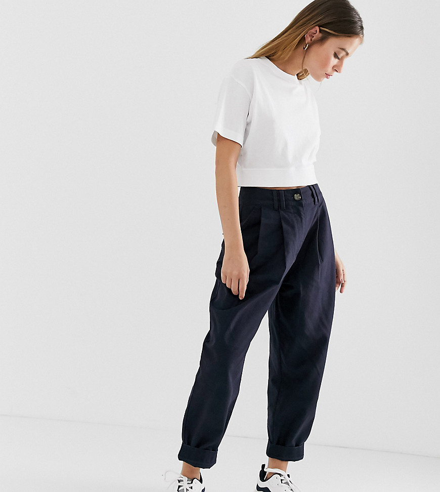 ASOS DESIGN Petite ovoid pleat front pegged pants in navy