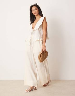 ASOS DESIGN Petite - Pantalon à enfiler en gaze de coton avec bords effilochés - Babeurre-Blanc XS