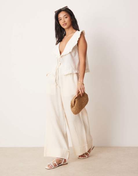 ASOS DESIGN Petite - Pantalon à enfiler en gaze de coton avec bords effilochés - Babeurre - view 1