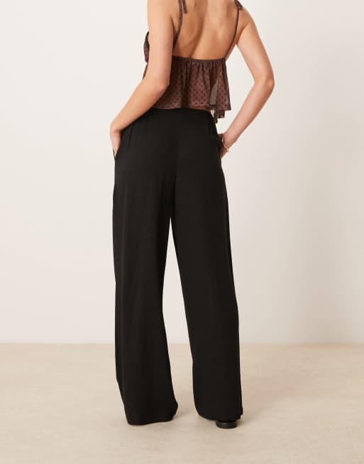 ASOS DESIGN Petite relaxed straight leg linen mix pants in black