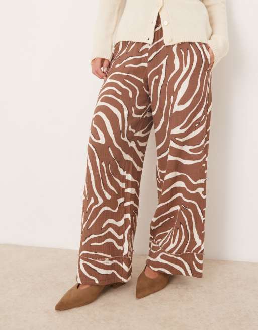 ASOS DESIGN Petite Pantaloni in mussola con stampa zebrata ASOS