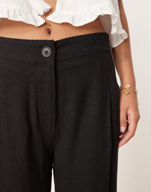 ASOS DESIGN Petite pleat front tapered trousers with linen in black, 4 of 5