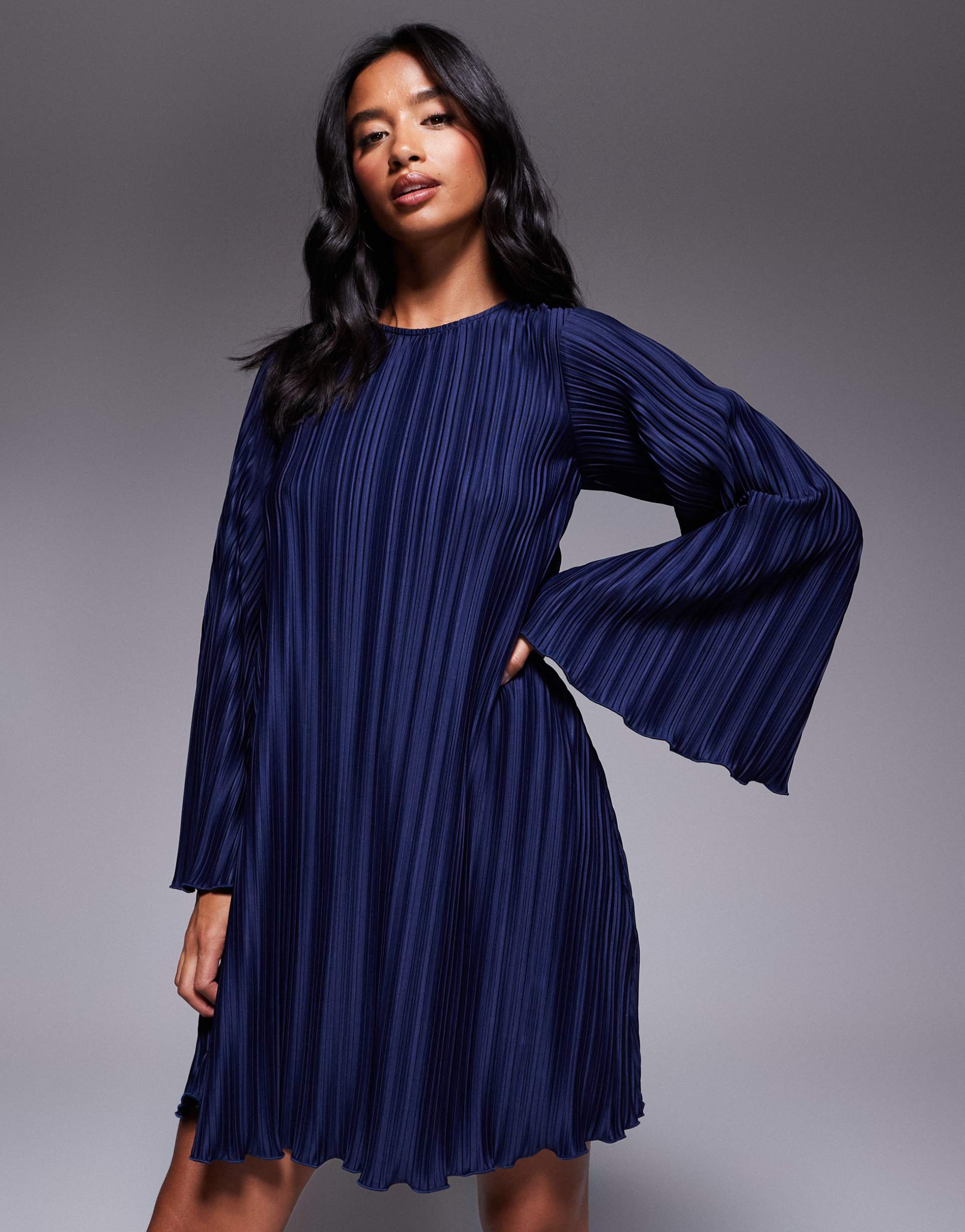asos design petite plisse wide sleeves mini dress with back bow detail in navy