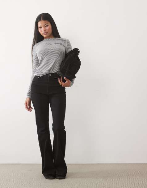 ASOS DESIGN Petite power stretch sculpt flare jeans in black - view 1