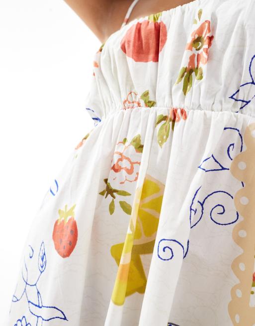 ASOS DESIGN Petite - Prendisole corto con bustino arricciato con stampa e spalline regolabili, 2 di 4