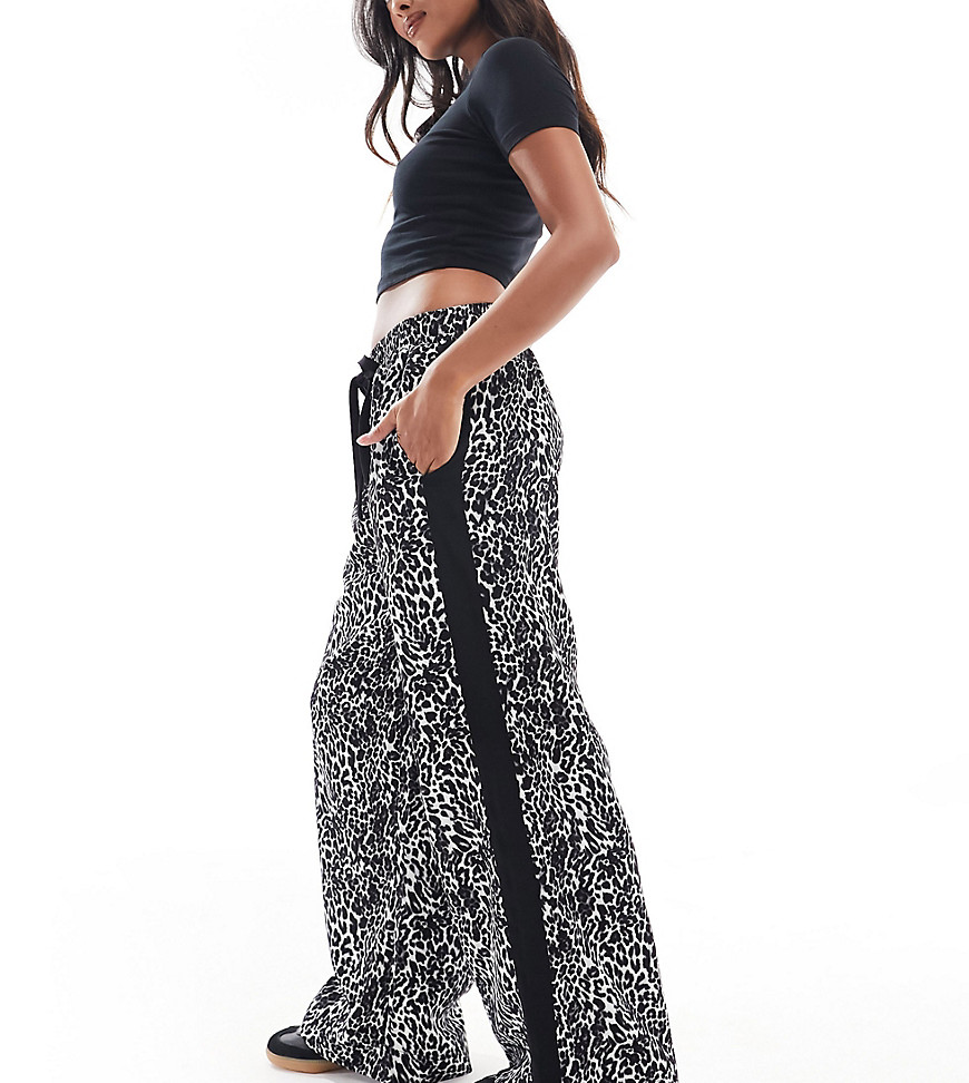 ASOS DESIGN Petite pull on trouser with contrast panel in mono animal print-Multi