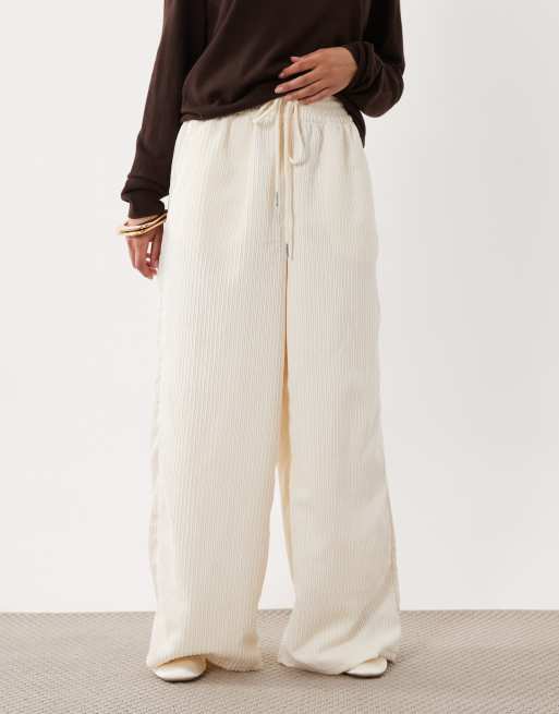 ASOS DESIGN Petite pull on waist wide leg corduroy pants in eggnog, 2 of 5
