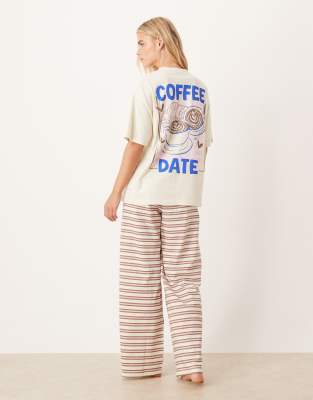 ASOS DESIGN Petite - Pyjama, bestehend aus Oversize-T-Shirt mit „Coffee Date"-Grafikprint und Hose mit weitem Bein in Br...
