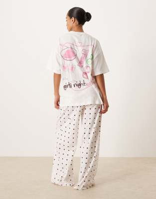 ASOS DESIGN Petite - Pyjama mit Oversize-T-Shirt mit „Girls Night"-Motivprint und weit geschnittener Hose-Bunt