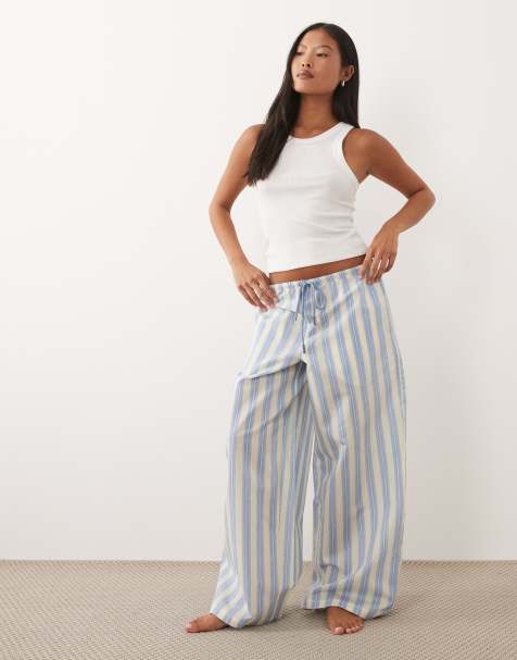ASOS DESIGN Petite – Pyjamahose aus gestreiftem Webstoff in Blau und Zitronengelb - view 1