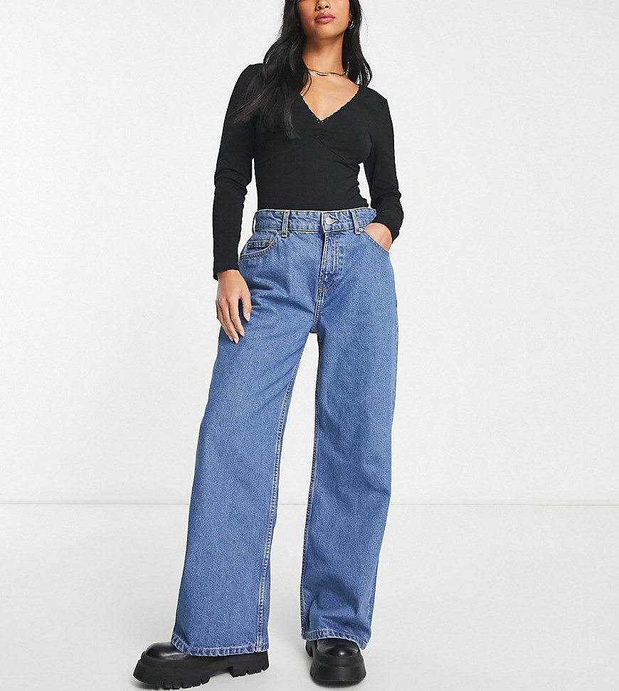 ASOS DESIGN Petite relaxed dad jeans in mid blue