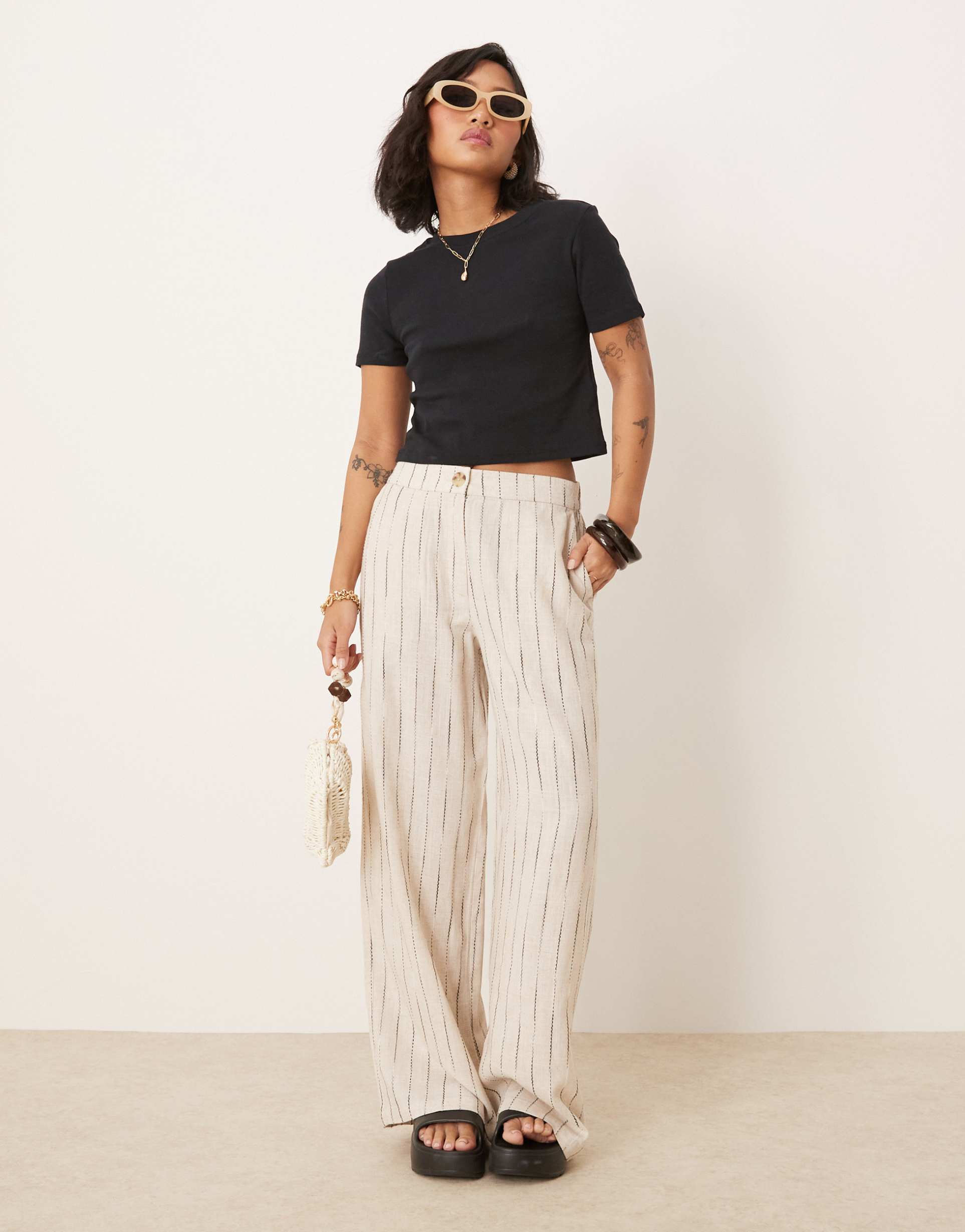asos design petite relaxed straight leg linen blend pants in natural squiggle stripe