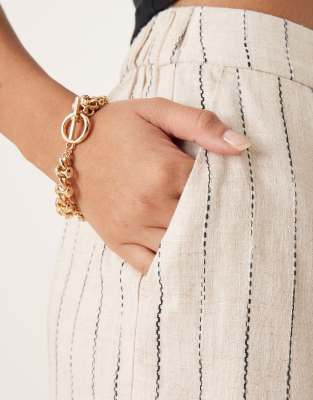 ASOS DESIGN Petite relaxed straight leg linen blend pants in natural squiggle stripe