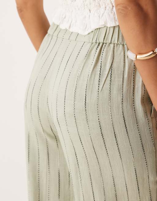 ASOS DESIGN Petite relaxed straight leg linen blend pants in sage squiggle stripes