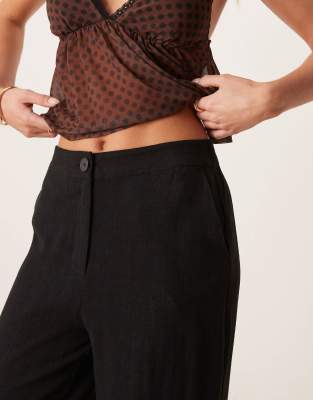 ASOS DESIGN Petite relaxed straight leg linen mix pants in black